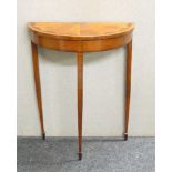 A 20th century mahogany demi lune pier table, with an inlaid top, 59cm wide