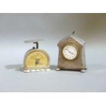 A silver letter scale, Birmingham 1902, 8.5cm, dial poor, and a Mappin & Webb silver clock, 10cm,