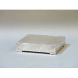 A silver Art Deco jewellery box, with engine turned decoration, and plush lined interior, 16.5cm
