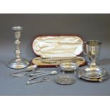 Silver items, to include a candlestick, cup, pin dishes, etc