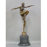 A reproduction bronze figure of an Art Deco dancer, on marble base