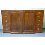 A 19th century mahogany breakfront press cupboard, with central doors and two columns of five