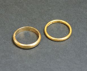 A 22ct gold wedding ring, and a 9ct gold wedding ring