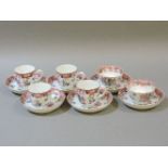 A set of 18th century Chinese famille rose tea wares, comprising four cups, two tea bowls, and six