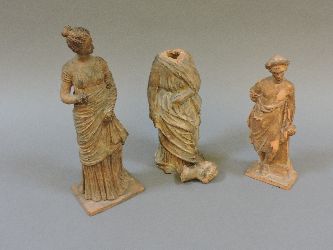 Three Greek terracotta figures, 2/3rd century BC style, tallest 24cm high