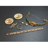 A late Victorian gold harp broch, set with split pearls, two 9ct gold Victorian brooches, a 9ct gold