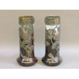 A pair of Art Nouveau pewter mounted vases, 34.8cm high