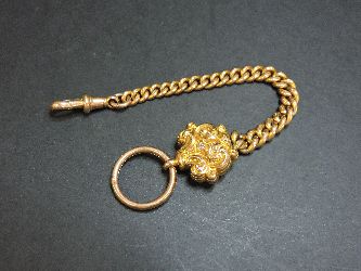 A 9ct gold watch fob, split ring and swivel