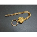 A 9ct gold watch fob, split ring and swivel