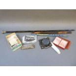 Railway postcards, cigarette cards, harmonica, two flutes, and a silver topped walking stick