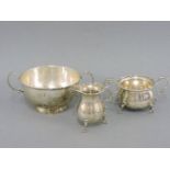 A silver two handled bowl, and a matching silver cream jug and sugar bowl, 10.8oz