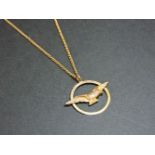 A gold bird pendant, on a gold chain, pendant marked 9ct