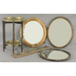 Three decorative wall mirrors, an Art Nouveau coat rack, and a two tier brass folding table