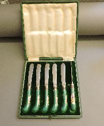 A set of six knives with porcelain handles, decorated with exotic birds