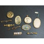 A 9ct gold photo locket, a gold Victorian Etruscan brooch tested as approximately 15ct gold, six