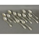 Twelve 19th century silver fiddle pattern dessert spoons, various dates, approximately 18oz