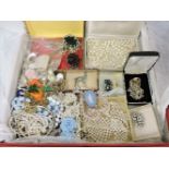 A quantity of costume jewellery, including faux pearl necklace, and brooches