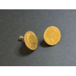 A pair of half sovereign screw on gold earrings, coins dated 1906 and 1906