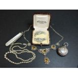 A sterling silver sovereign case, a Continental silver filigree necklace marked 800, a sterling