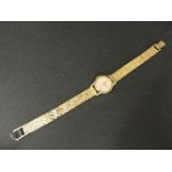 A ladies 18ct gold Omega mechnical watch, on a later gold plated bracelet, case no 2683, movement no