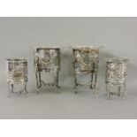 Four silver plated jardinières, with cast and pierced decoration on paw foot legs, tallest 21cm