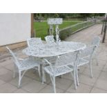 A set of six white painted garden chairs, with matching table and jardinière stand