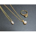 Two 9ct gold cubic zirconia single stone pendants, and a 9ct gold single stone ring set with a