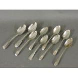 Seven silver dessert spoons, old English pattern, various dates, and two fiddle pattern dessert