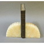 A pair of Art Deco alabaster bookends, 14cm high