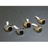 Five 9ct gold hardstone set gentleman's signet rings, to include a white gold example