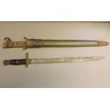 A WWI US Remington bayonet, dated 1917, with original scabbard