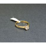 An 18ct gold single stone diamond ring, estimated as approximately 0.27ct