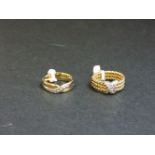 Two 9ct yellow and white gold diamond set band rings