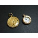 A key wound gold fob watch, marked 18k, together with a gold Swiss fob watch marked 0.585