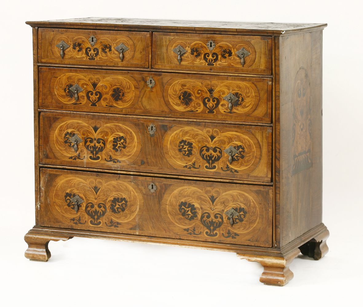 A marquetry chest of drawers, early 18th century, of two short and three long drawers, inlaid with