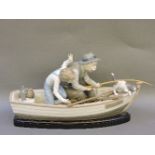 A Lladro figural group, 'Fishing with Gramps', damage to oar handle