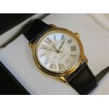 A gentleman's cased gold plated Frédérique Constant automatic strap watch, with skeleton back,