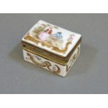 An 18th century porcelain patch box, with Meissen mark