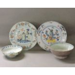 Two polychrome Delft plates, and two bowls