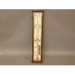 A reproduction Victorian style stick barometer, in mahogany case