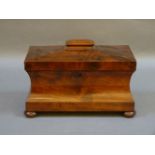 A Regency mahogany tea caddy, of sarcophagus form, with mixing bowl