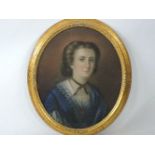 19th century SchoolPORTRAIT OF A LADY, BUST LENGTH IN A BLUE DRESSPastel, oval61 x 51cm