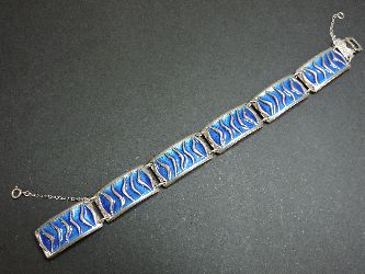 A sterling silver enamel waves bracelet, by David Anderson