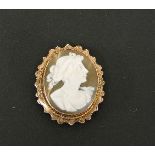 A gold cameo brooch, marked 9ct, damage, no pin