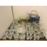 A quantity of glassware, including Victorian rummers, cut glass glasses, and decanters