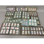 Ten albums of various cigarette cards