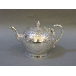 A Victorian silver bachelor's teapot, maker's mark Barnard Family,  overstruck FE London 1876