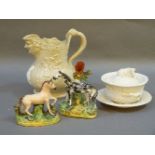 Two Staffordshire figures, including one of a pony painted black with spill vase, a Machin & Potts