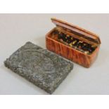 A 19th century tortoiseshell lined snuff box, and an Indian carved wood card case