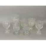 Seven cut glass rummers, two with square feet, the rest with turned feet, tallest 17cm high